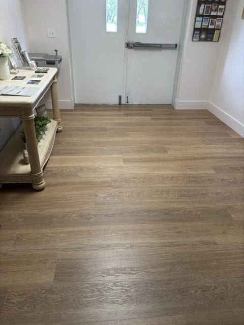 New wood-look flooring running down the hall